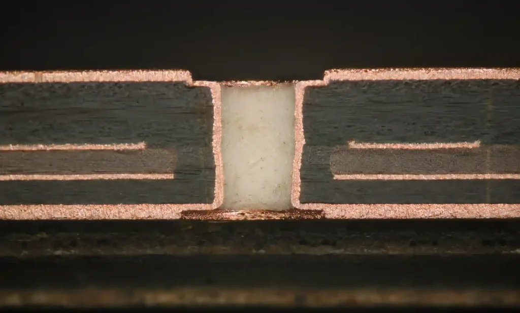 Cross-section comparison of HDI microvia structure versus traditional through-hole via