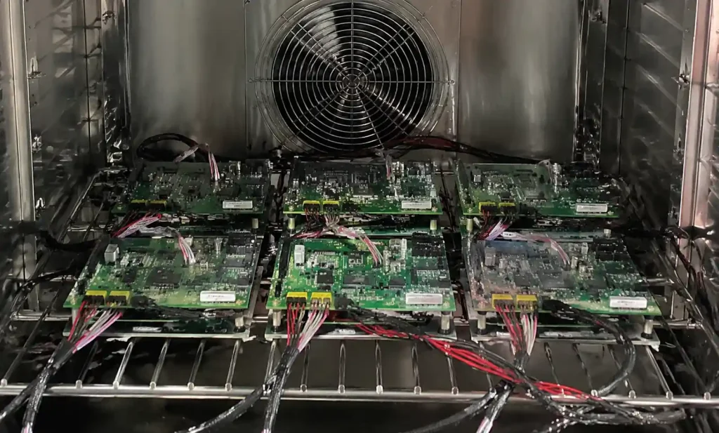 PCB test boards in thermal cycling chamber for reliability testing