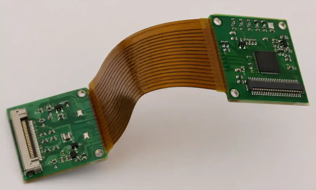 Demonstration of proper bend radius and flex zone design in rigid-flex PCB