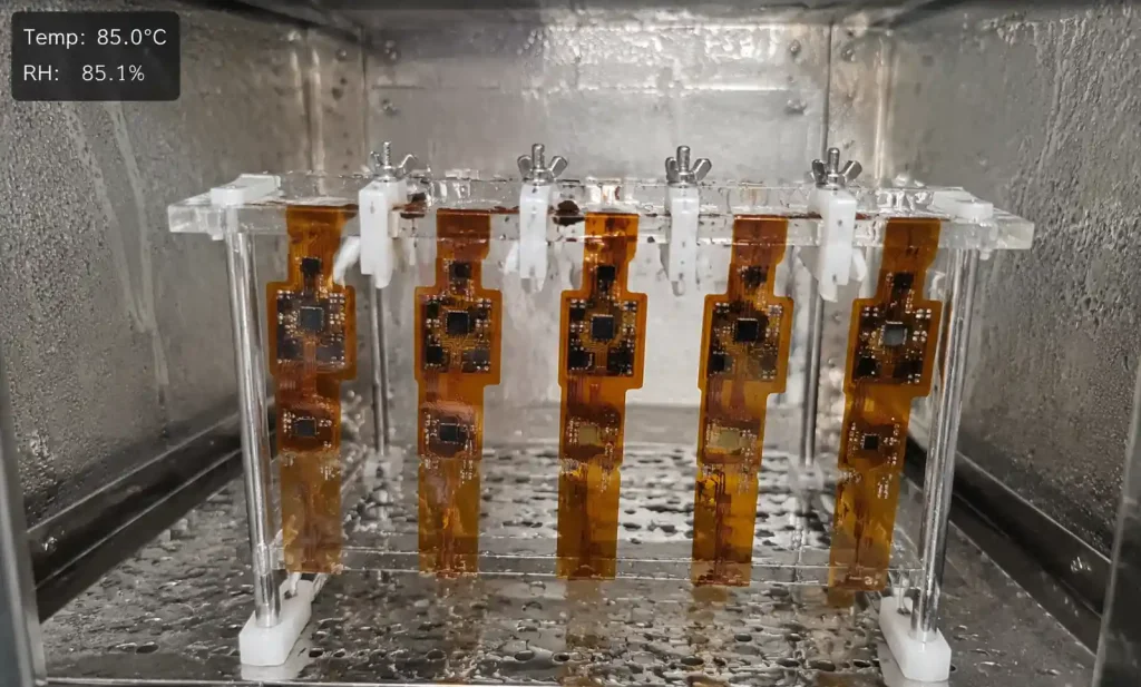 Flexible PCB samples in environmental test chamber showing thermal cycling and humidity testing setup