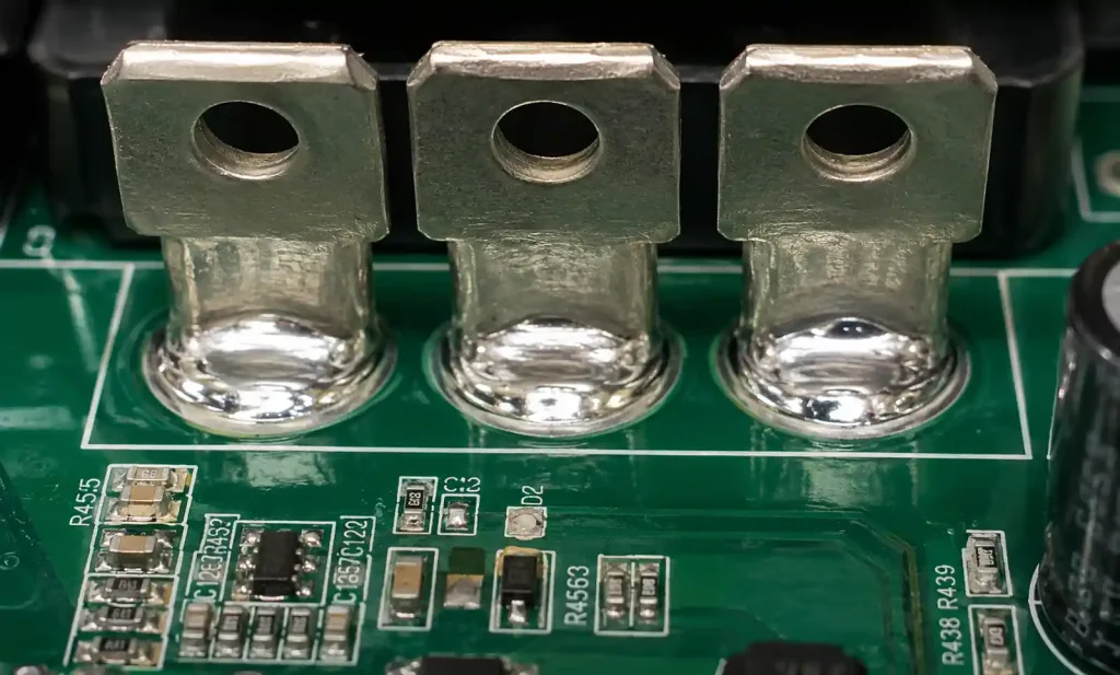 Through-hole soldering of high-current busbar terminals on solar inverter PCB