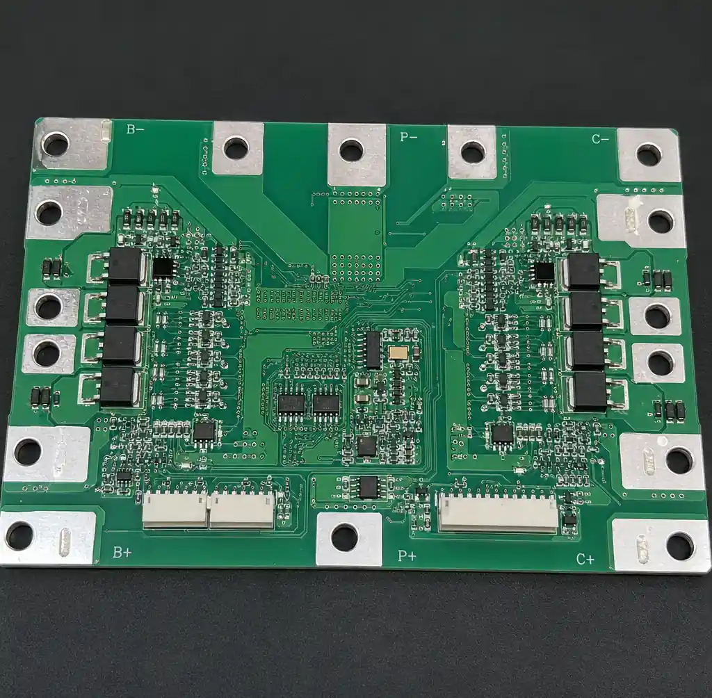 High current PCB traces on BMS board showing wide copper paths for 100A+ battery discharge routing