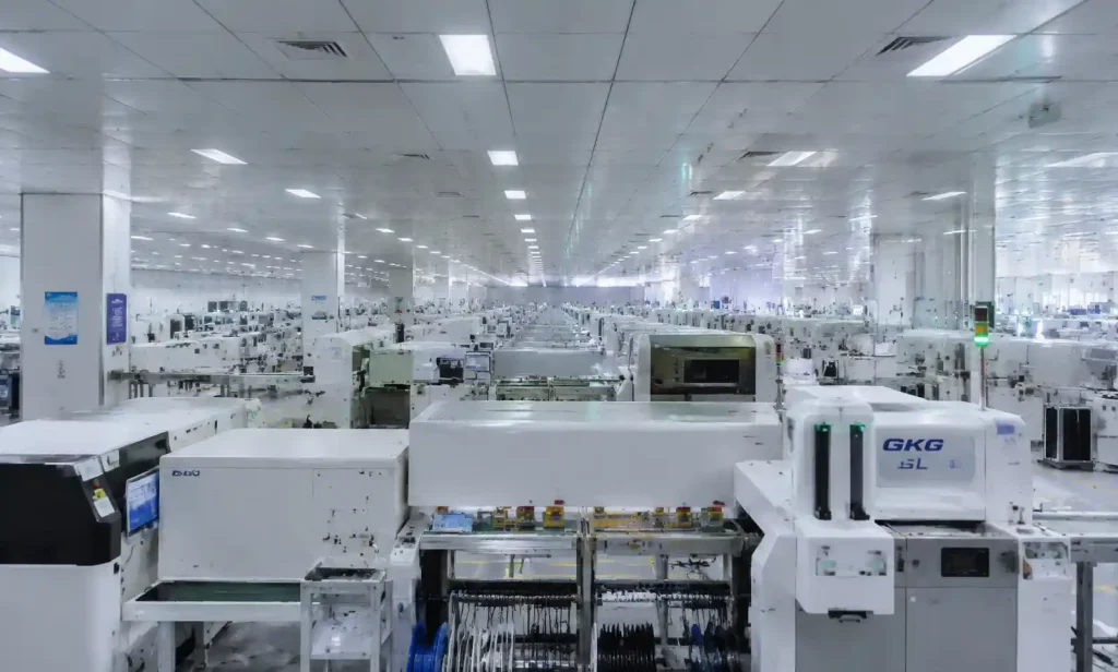 Modern PCB manufacturing facility in China's Guangdong industrial corridor showing automated production lines