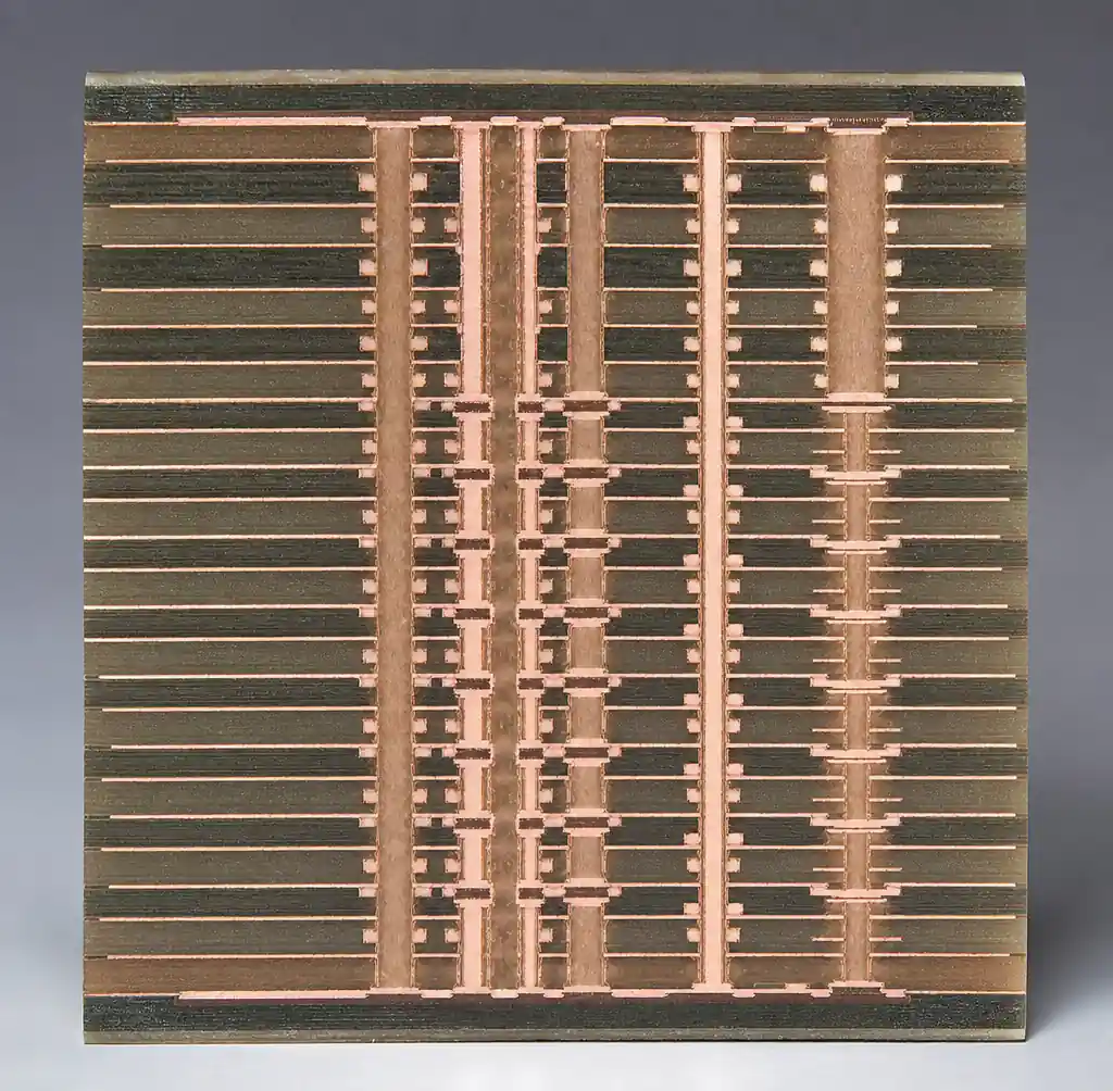 Cross-section of high-layer-count multilayer PCB showing copper layer stackup