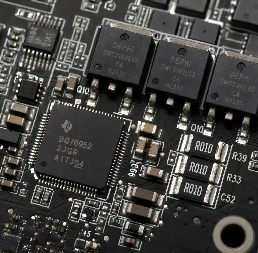 Automotive-grade BMS components including AFE IC, MOSFETs, and capacitors rated for AEC-Q100 qualification