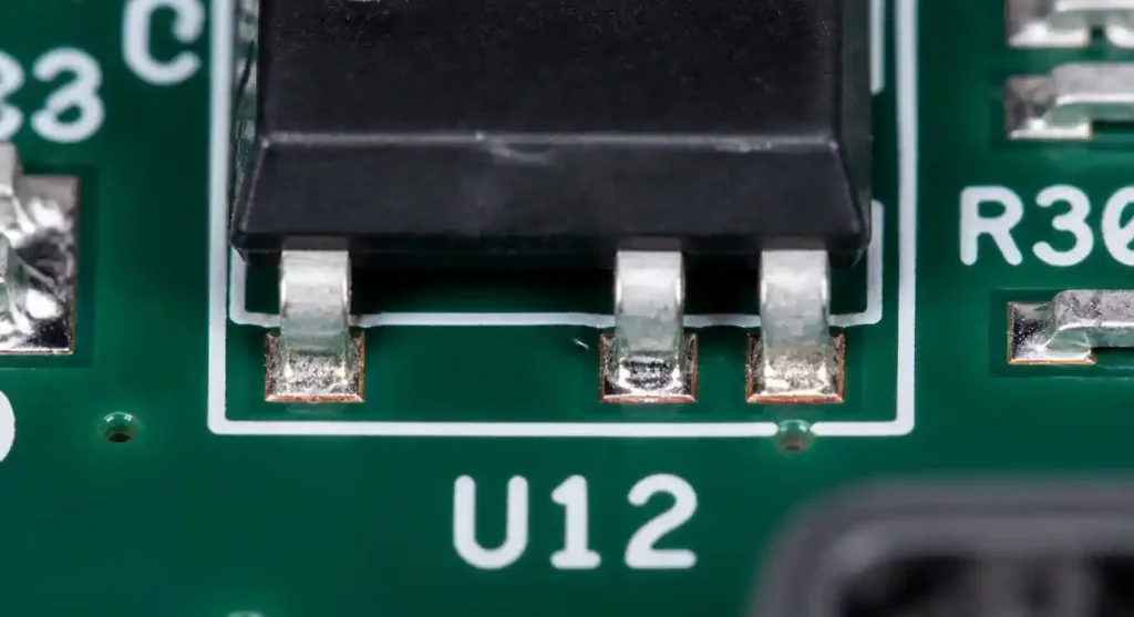 Insufficient solder defect showing incomplete pad coverage and exposed copper on PCB
