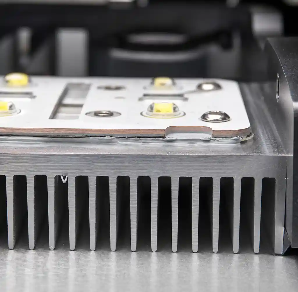 Metal core PCB attached to heat sink showing thermal interface