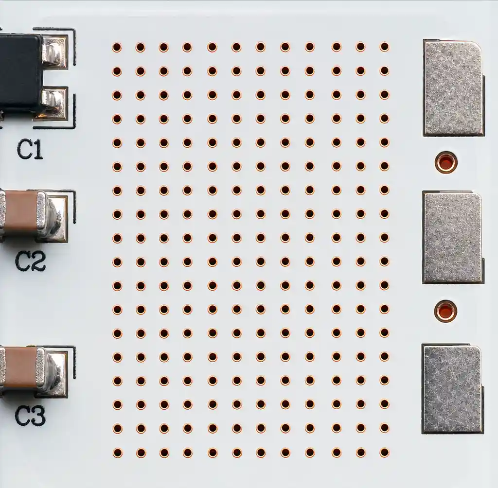 Metal core PCB thermal via array under power component pads",