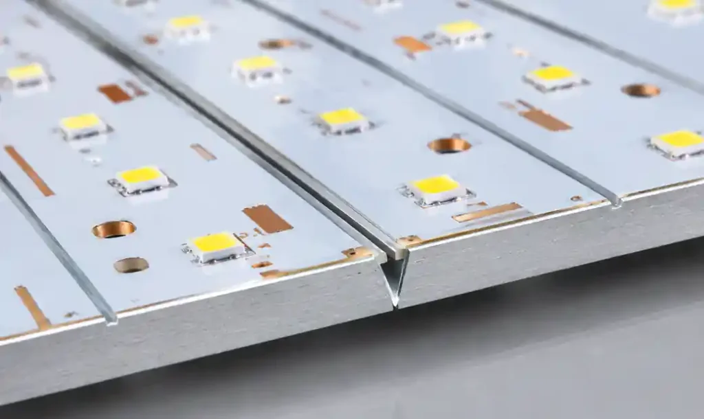V-scoring groove on aluminum MCPCB panel showing score depth and profile