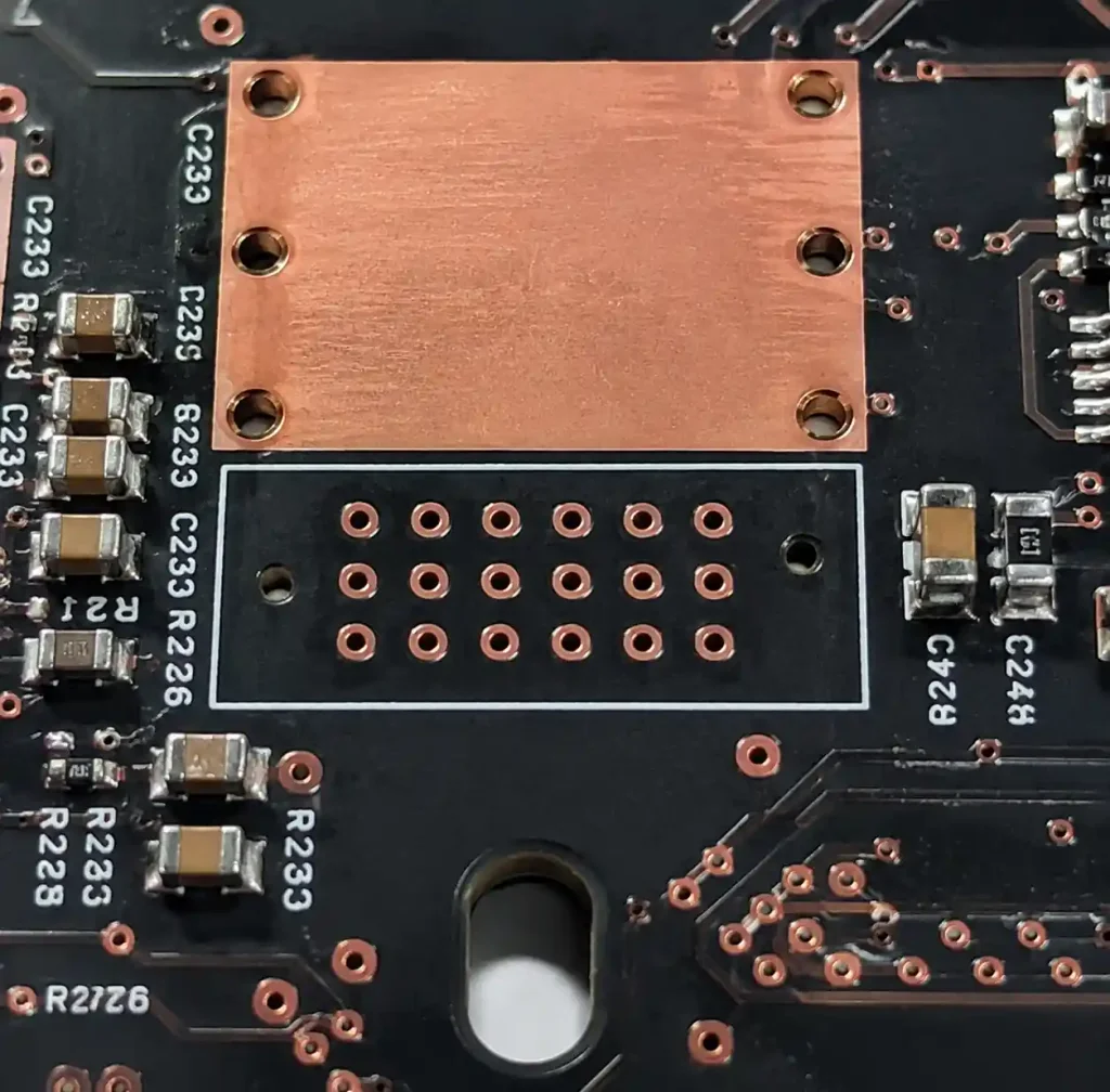 Thermal via array beneath MOSFET thermal pad on PCB