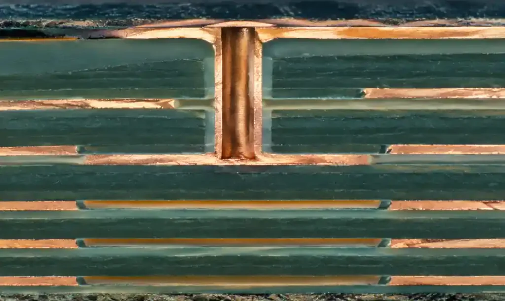Blind via cross-section showing connection from outer layer to inner layers in HDI PCB