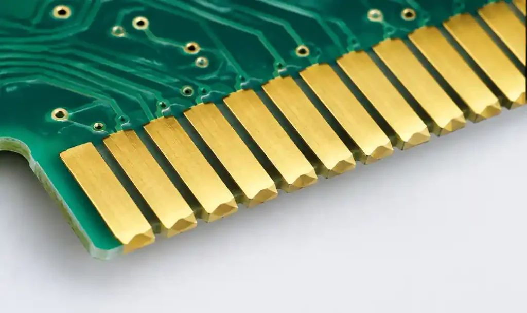 PCB gold fingers showing hard gold plated contact pads along board edge with beveled entry